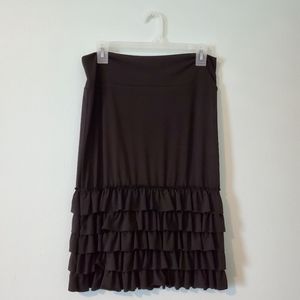 Black ruffle skirt extender.